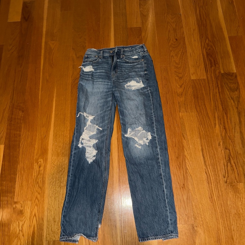 Distressed Blue Denim Jeans